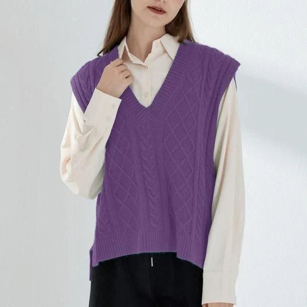 Cosy oversized knitted vest in various colours, featuring a sleeveless V-neck design for versatile layering