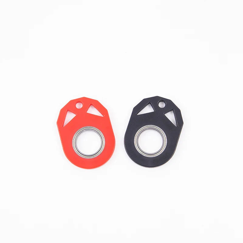 Creative fidget spinner keychain with bottle opener, available in various colours for stress relief and focus improvement
