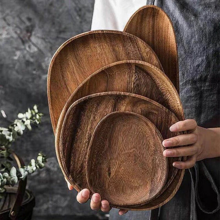 Elegant wooden dining plates with a minimalist, laconic design and natural wood grain