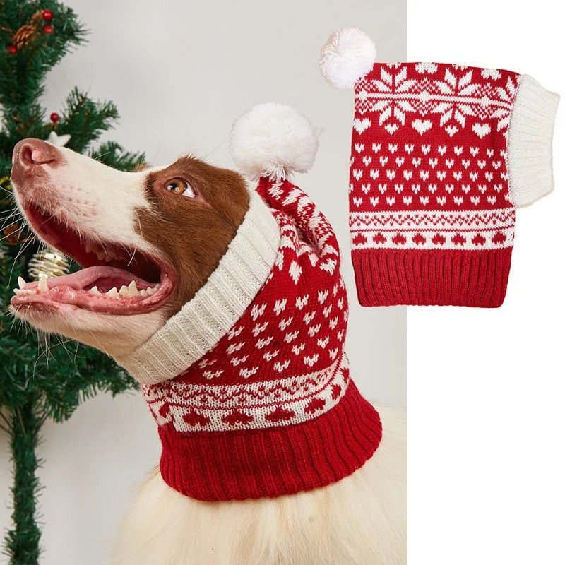 A cosy, knitted pet hat in a festive snowflake and reindeer design, available in various sizes to fit dogs and cats.