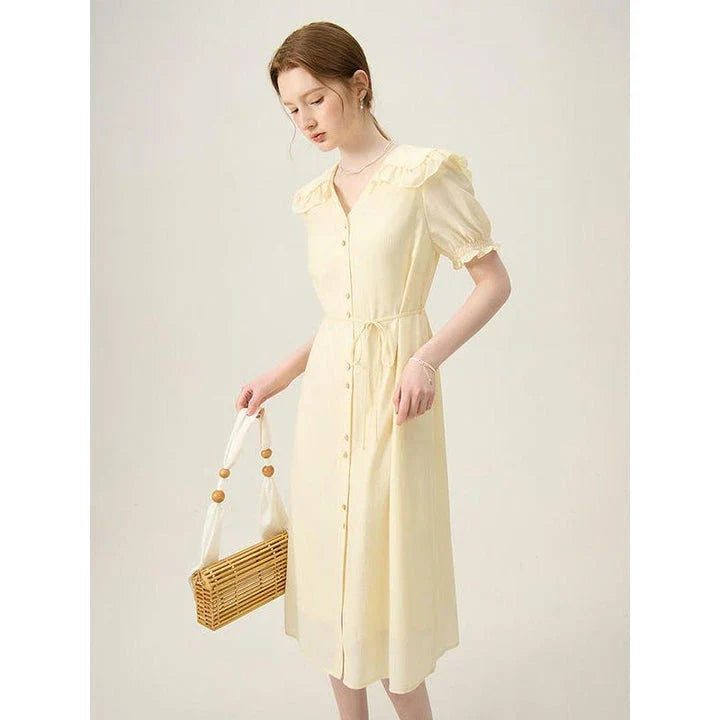 Elegant navy blue sailor collar dress with delicate fungus-edged sleeves, versatile and stylish for summer events