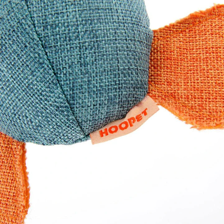 A soft, plush duck toy designed for dogs, featuring a squeaky component to encourage playful interaction.