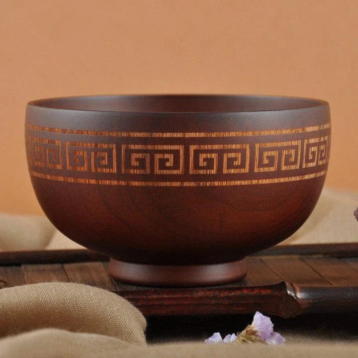 Elegant Mongolian-style wooden serving bowl with a smooth, natural grain and subtly curved silhouette