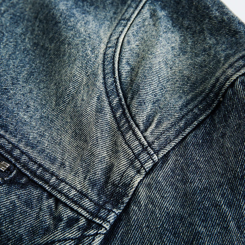 Retro-inspired men's denim jacket with intricate embroidered detailing, perfect for casual and smart-casual outfits