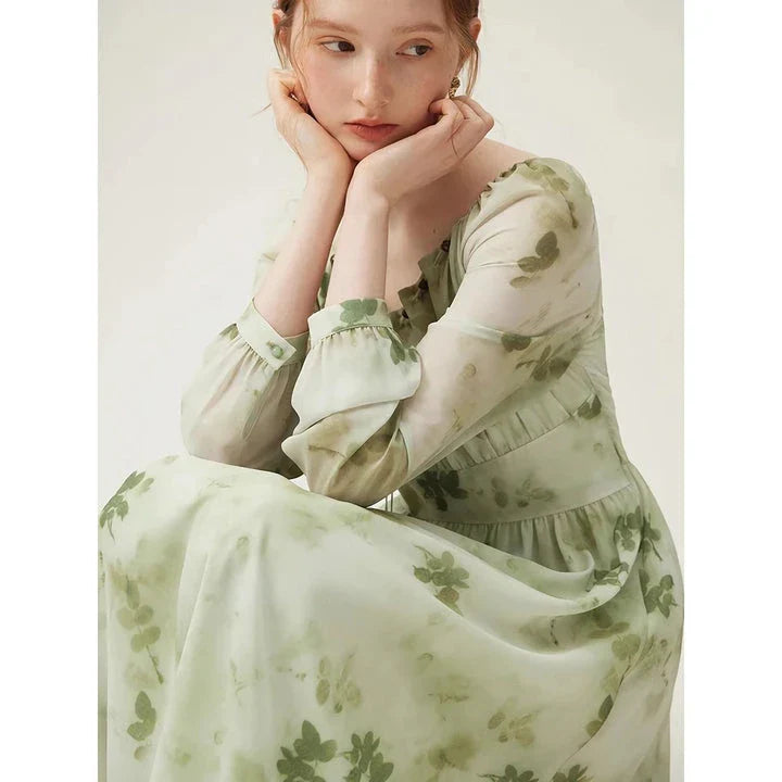 Elegant Chinese-style dress with empire waistline, full-length sleeves, and midi length for a timeless, sophisticated look.