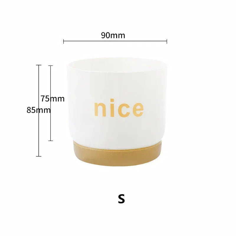 Elegant self-watering planters in various sizes, perfect for indoor plants and home or office decor