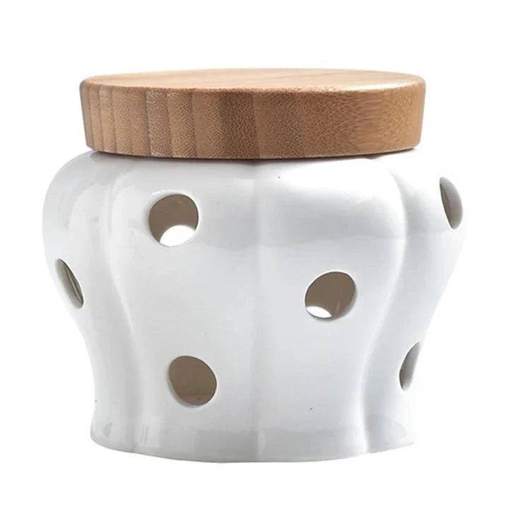 Ceramic and wood garlic storage jar with airtight design and stylish appearance for modern British kitchens