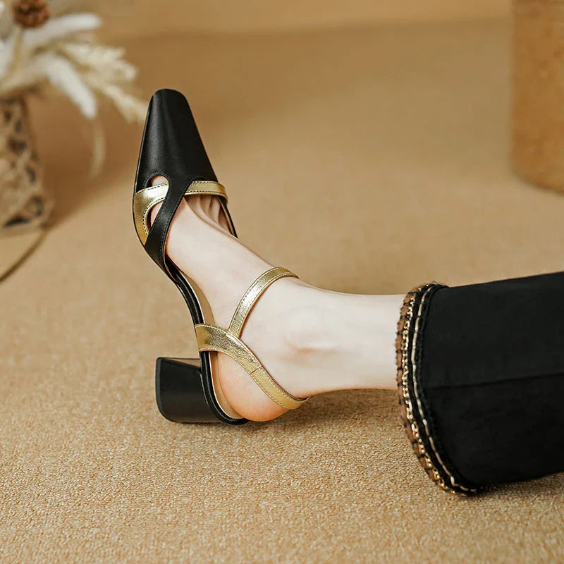 Elegant green high heel sandals with ankle strap, showcasing a sophisticated square heel design and premium materials