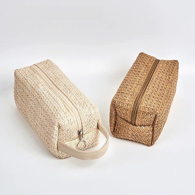 Elegant straw cosmetic bag with unique knitting pattern, ideal for organizing makeup and toiletries