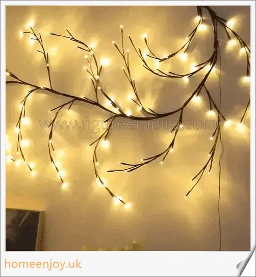 Enchanting willow vine with warm white LED lights, creating a serene and cozy ambience in a living room