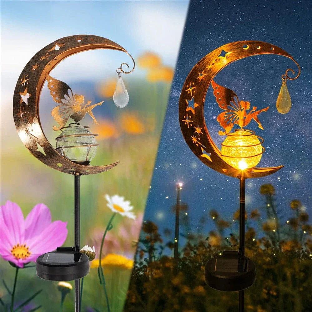 Decorative solar-powered garden light with a fairy and moon design, providing enchanting illumination for pathways, patios, and lawns.
