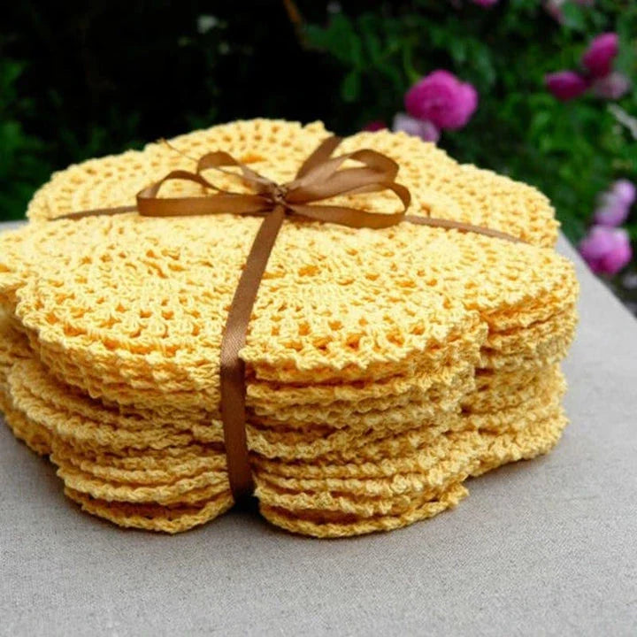 Handcrafted crochet placemats in various classic colours, showcasing the timeless elegance of British craftsmanship