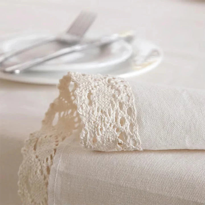Elegant polyester linen tablecloth with delicate lace edging, available in various sizes for a sophisticated dining experience.