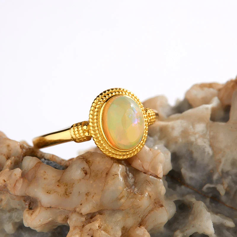 Elegant S925 sterling silver ring with a natural opal gemstone in a geometric design