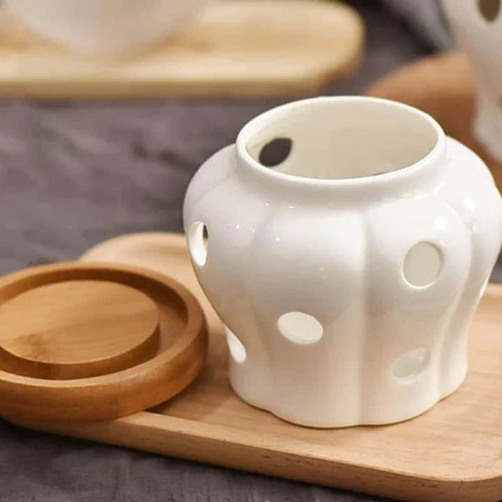 Ceramic and wood garlic storage jar with airtight design and stylish appearance for modern British kitchens
