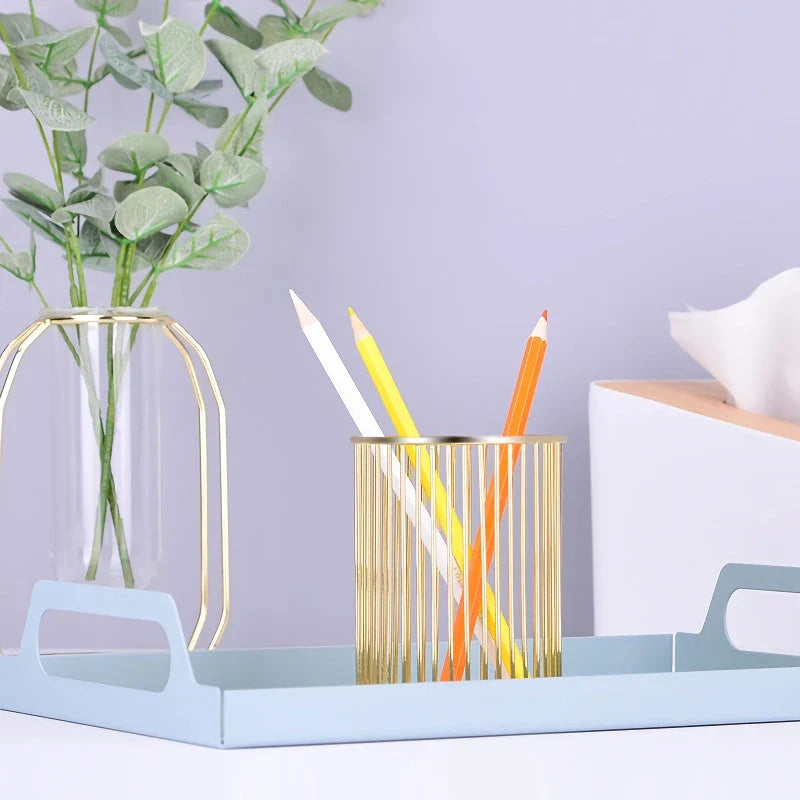 Rose gold plated pen holder with a sleek, minimalist design for organising pens, makeup brushes, and other desk accessories