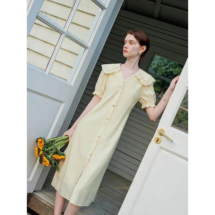 Elegant navy blue sailor collar dress with delicate fungus-edged sleeves, versatile and stylish for summer events