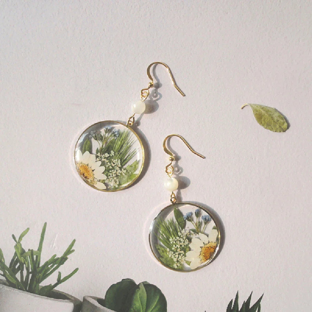 Elegant natural floral earrings with dried flowers and copper gilding, embodying British style and sophistication