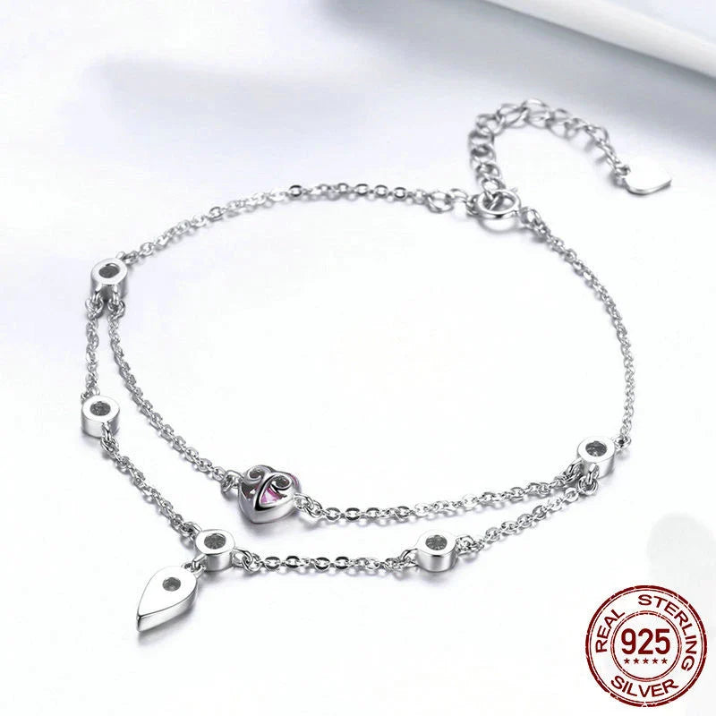 Elegant silver bracelet with a delicate sweetheart design, perfect for adding a touch of sophistication to any outfit.