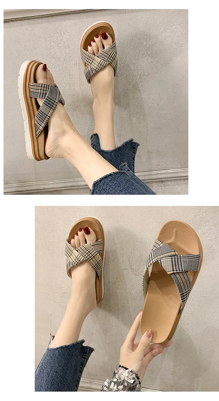 Comfortable and stylish herringbone slippers with a charming bow detail, perfect for indoor and light outdoor use.