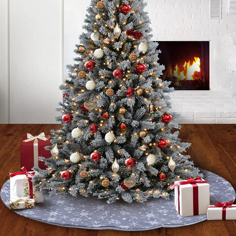 Grey background with intricate white snowflake design Christmas tree skirt