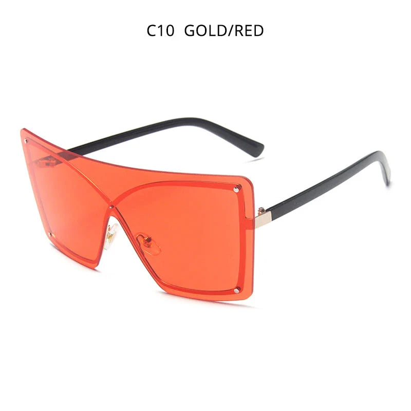 Stylish oversized flat top sunglasses with a rimless design, providing UV protection and a comfortable fit for the modern British woman