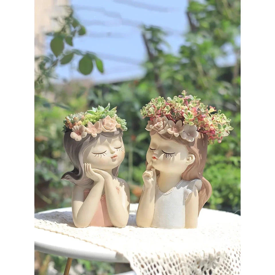 A charming 7.8-inch resin planter in the shape of a fairy girl, perfect for displaying succulents and adding whimsical decor to your home or office.