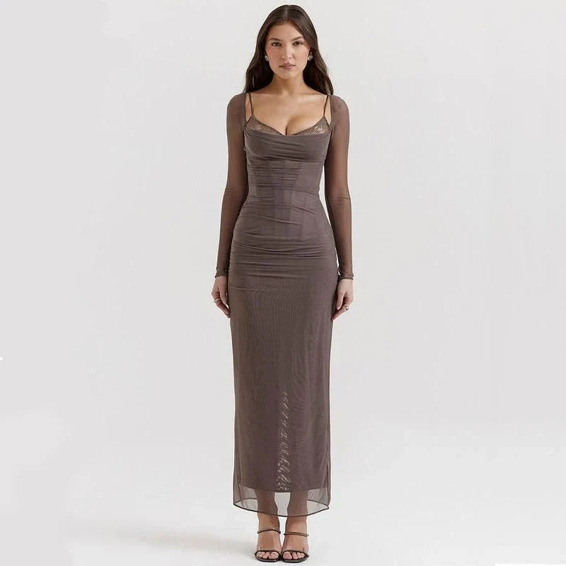 Elegant black sheer long sleeve maxi dress with a flattering H-profile silhouette, perfect for evening events and special occasions.