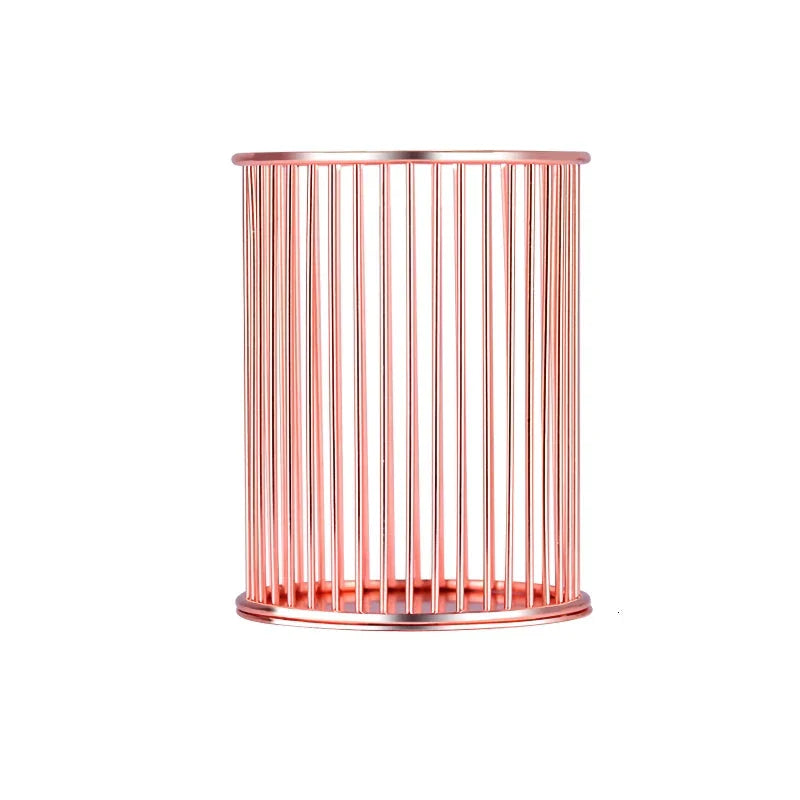 Rose gold plated pen holder with a sleek, minimalist design for organising pens, makeup brushes, and other desk accessories