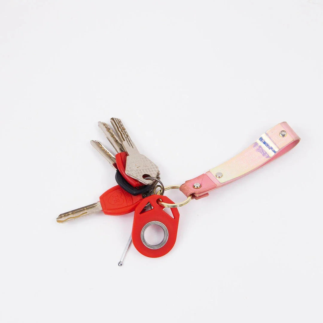 Creative fidget spinner keychain with bottle opener, available in various colours for stress relief and focus improvement