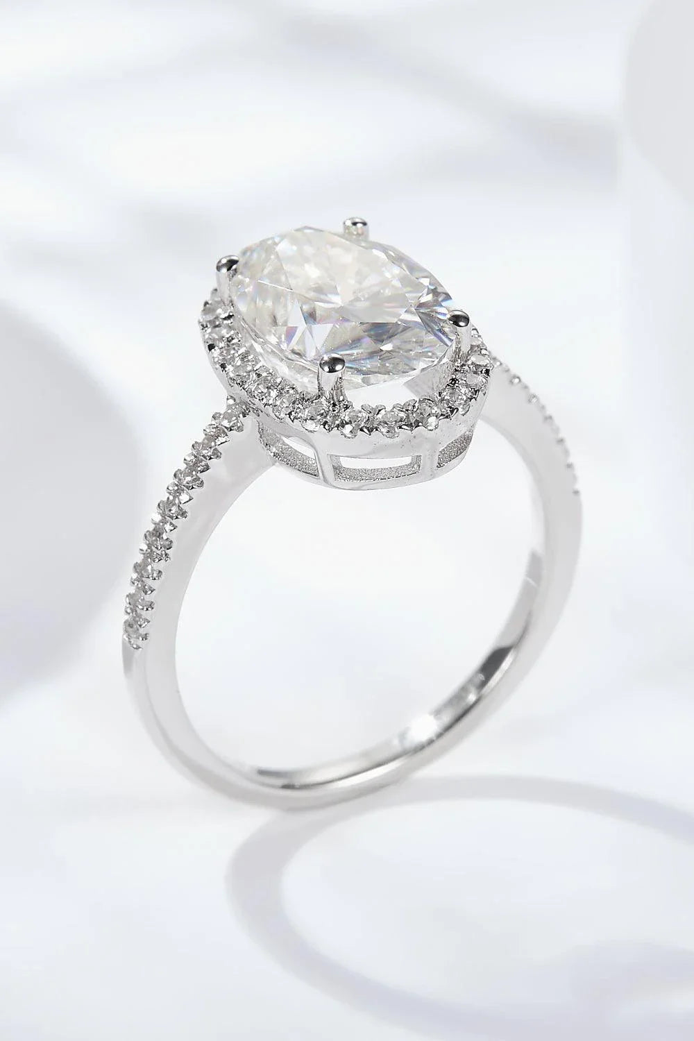 Elegant moissanite halo ring in polished sterling silver with a captivating 4.5-carat centre stone