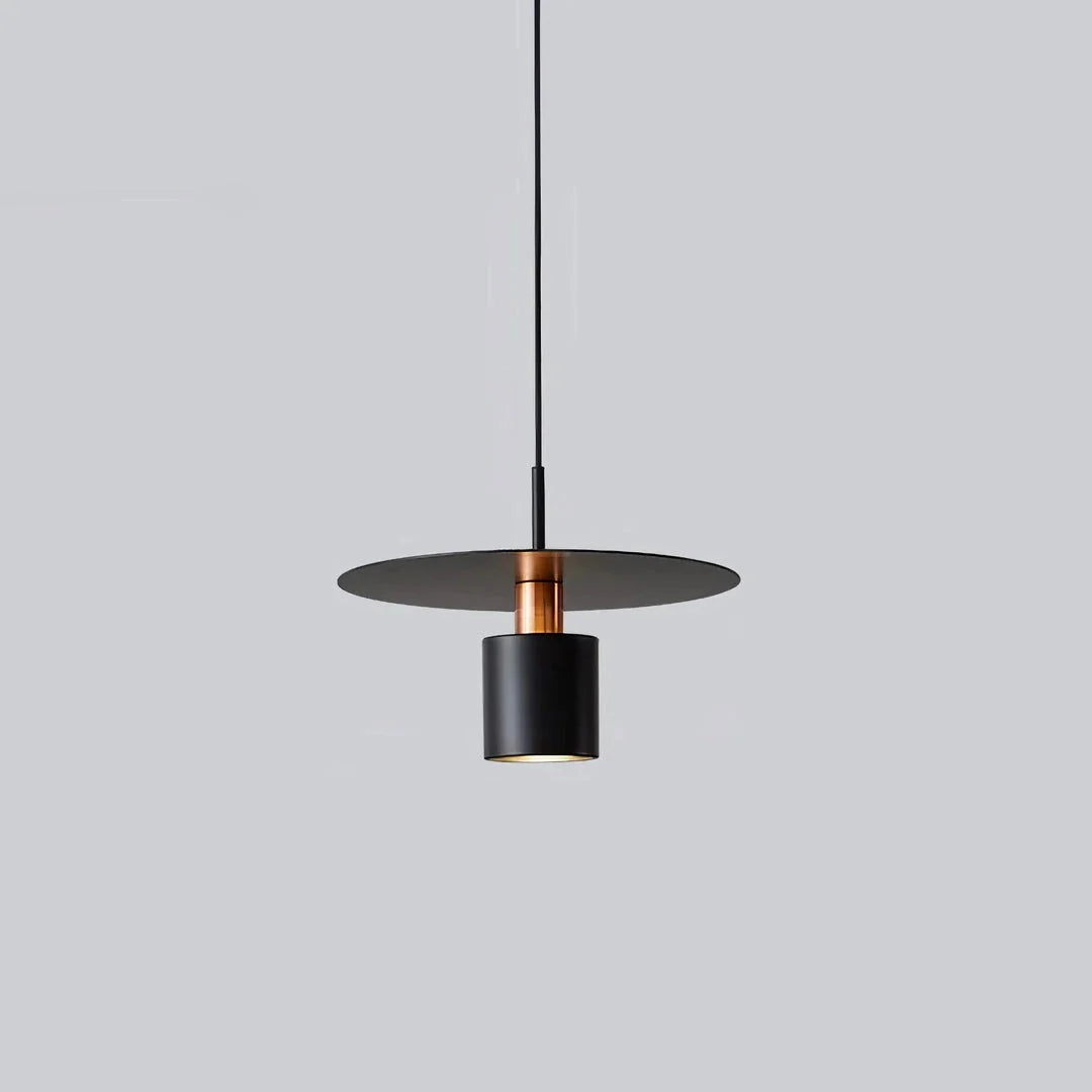 A modern and elegant minimalist pendant light made of durable metal with a smooth painted finish, providing focused and cosy illumination for a variety of interior spaces.