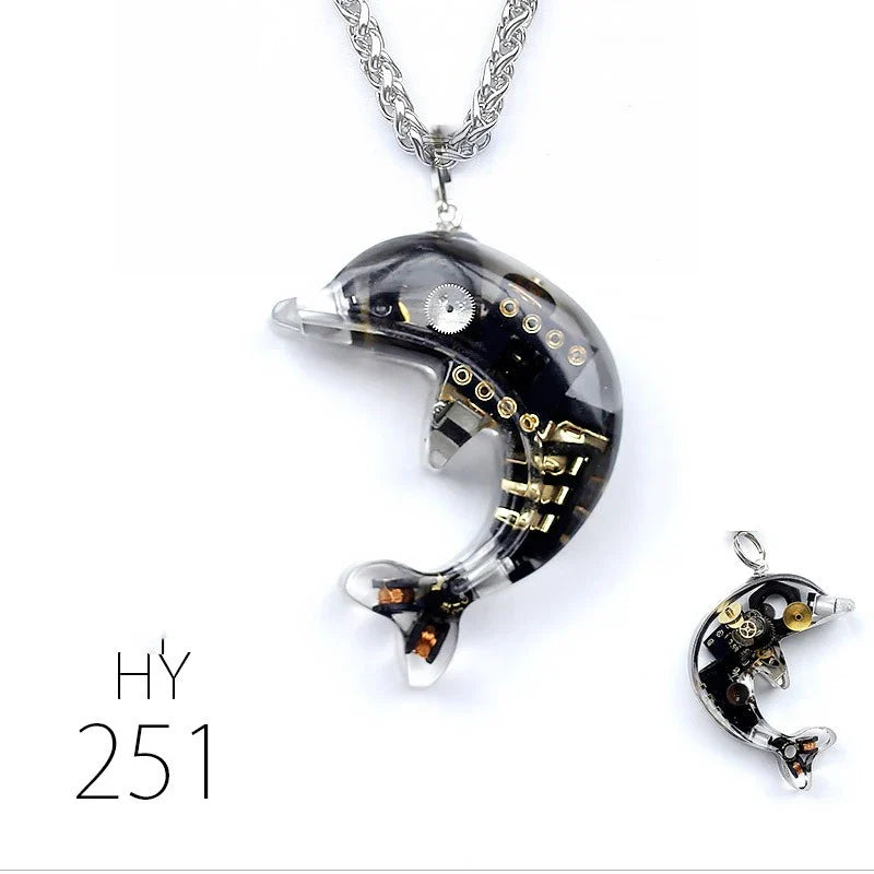 Steampunk-inspired dolphin pendant necklace with electronic components and brass accents