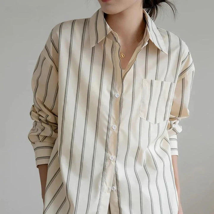 Elegant striped office blouse with chic drop shoulder design, made from premium polyester-cotton blend for durability and comfort