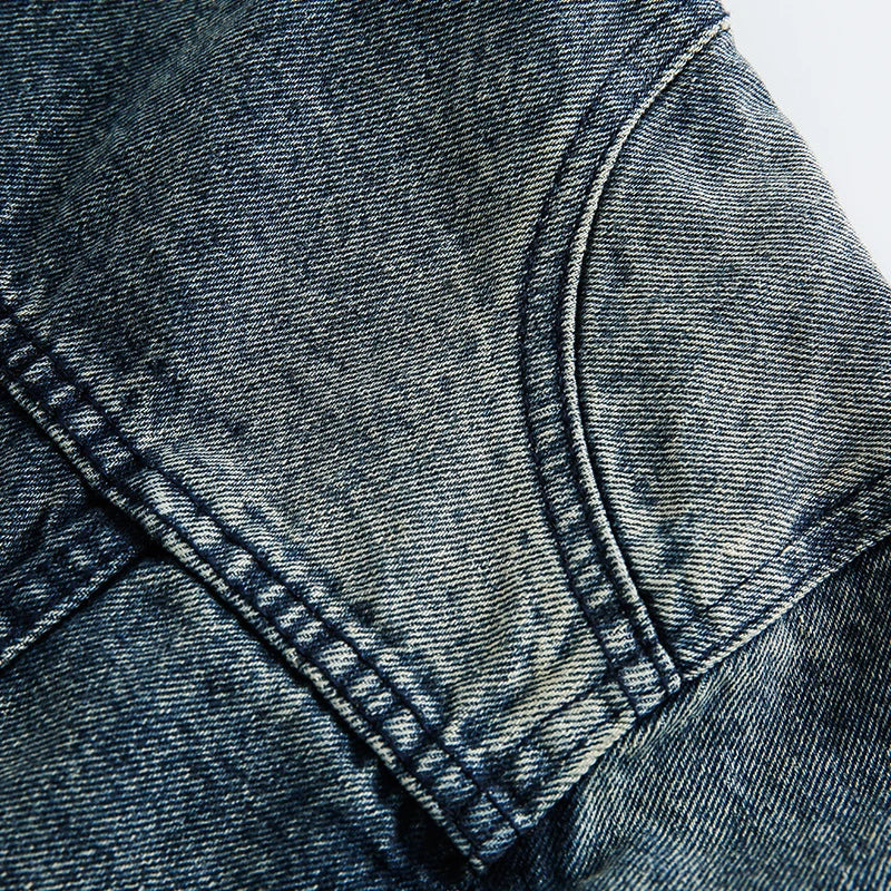 Retro-inspired men's denim jacket with intricate embroidered detailing, perfect for casual and smart-casual outfits