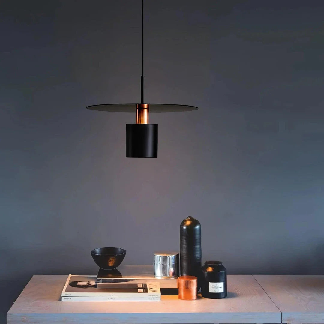 A modern and elegant minimalist pendant light made of durable metal with a smooth painted finish, providing focused and cosy illumination for a variety of interior spaces.