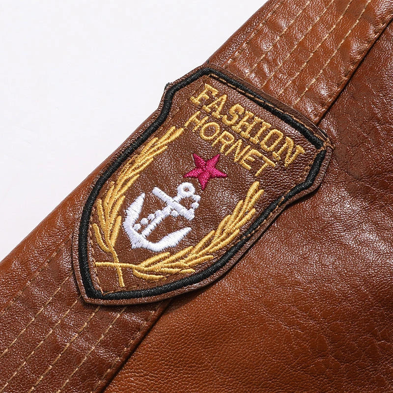 A stylish men's leather jacket with a stand collar, slim fit, and short length, offering premium quality and versatile wear.