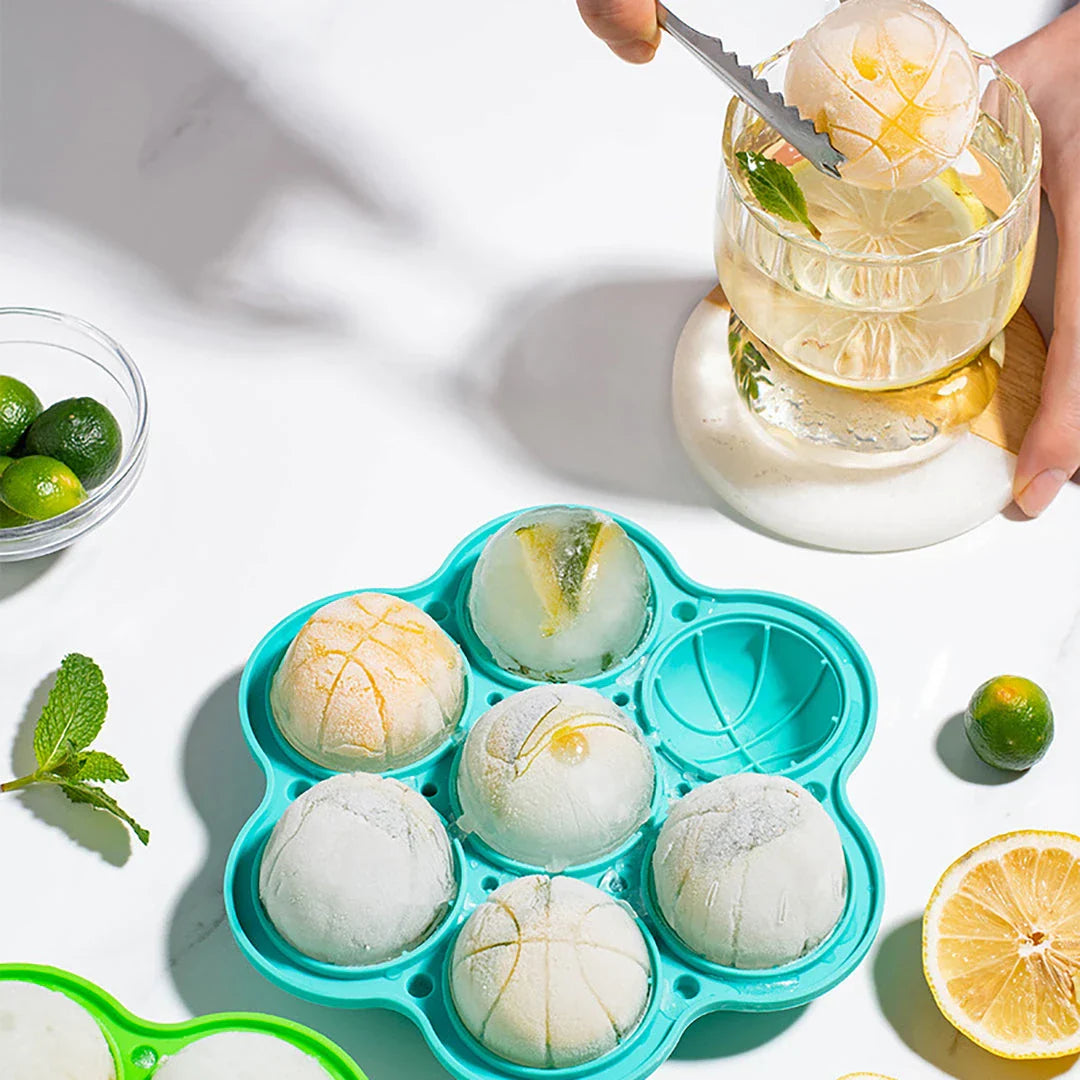 Spherical silicone ice mould with seven holes for creating elegant ice spheres to chill premium drinks