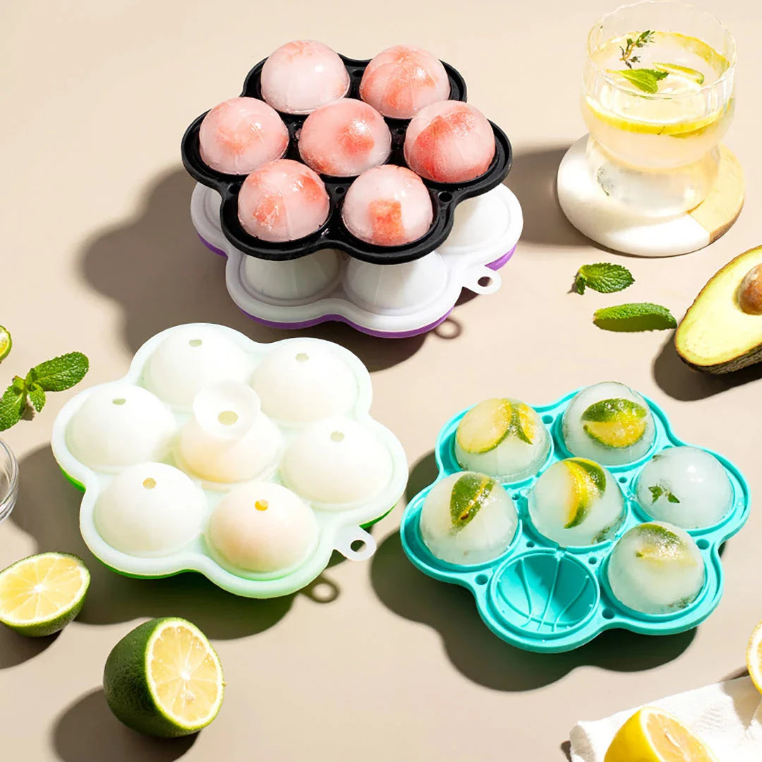 Spherical silicone ice mould with seven holes for creating elegant ice spheres to chill premium drinks