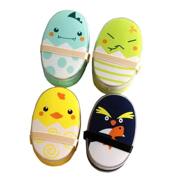 Egg-shaped children's lunch box in various colours, including black, green, blue, and yellow