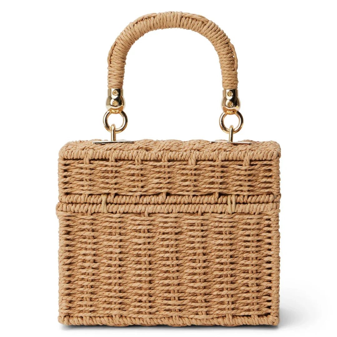 Handcrafted natural straw beach bag with bohemian-inspired design and detachable metal chain strap