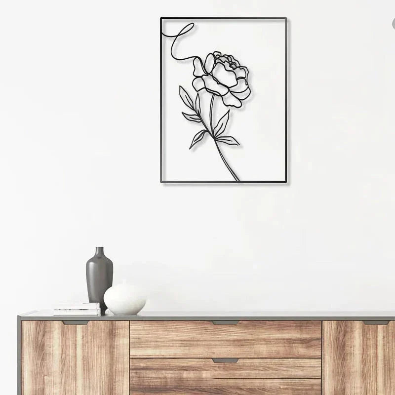 Abstract minimalist rose flower iron wall decor in black, featuring a sleek metal frame and elegant line painting