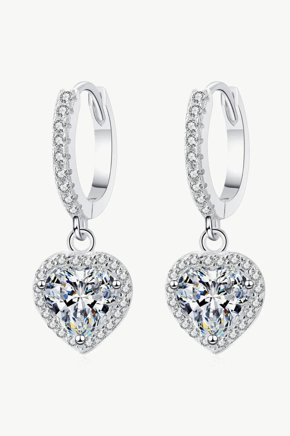 A pair of elegant moissanite heart-shaped drop earrings with a brilliant 2-carat display, crafted in 925 sterling silver with rhodium plating and zircon accents.