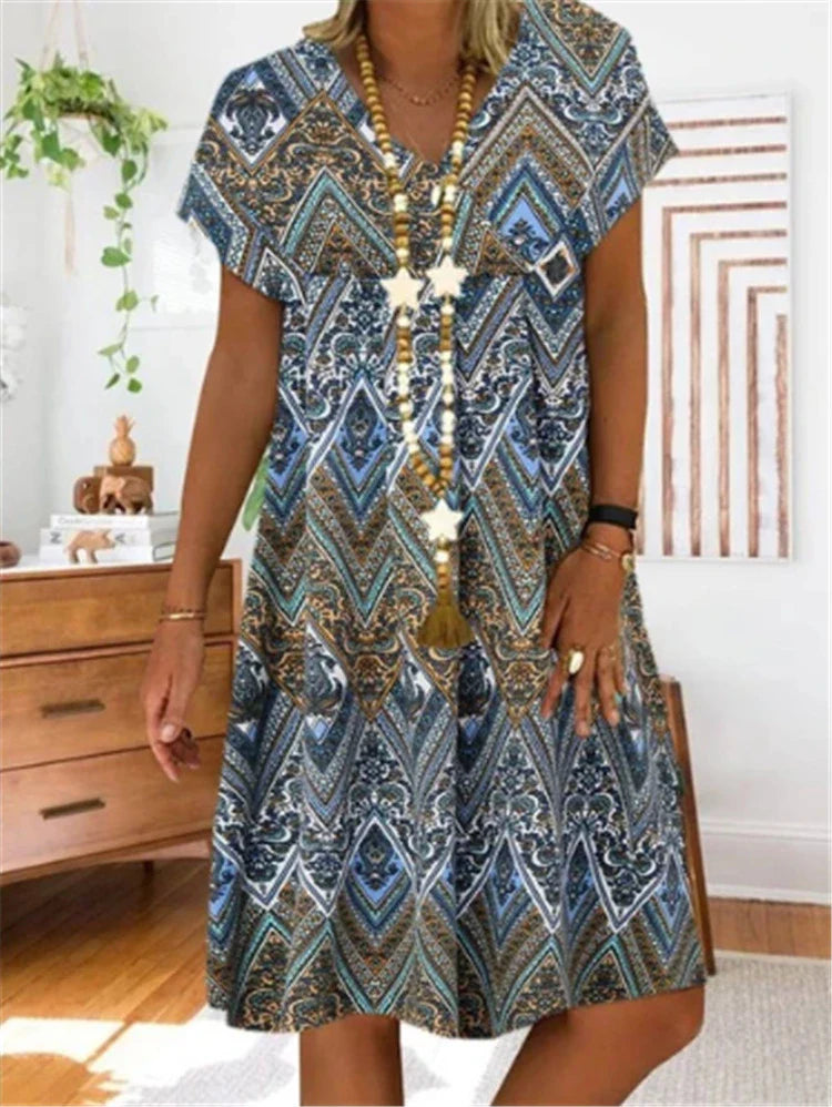 A stunning blue women's fashion dress with a flattering silhouette and elegant design
