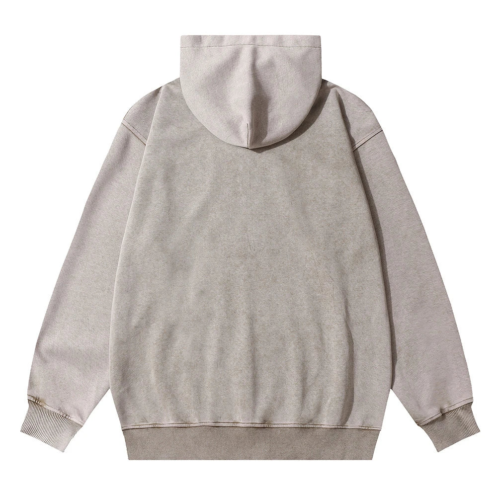 A premium cotton pullover hoodie with an embroidered letter patch in a variety of classic autumn colours