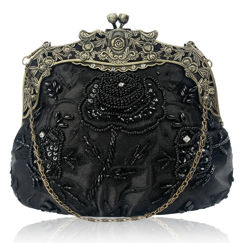 A black cosmetic bag with exquisite bead embroidery, featuring a silk surface and nylon fabric texture for a luxurious feel.