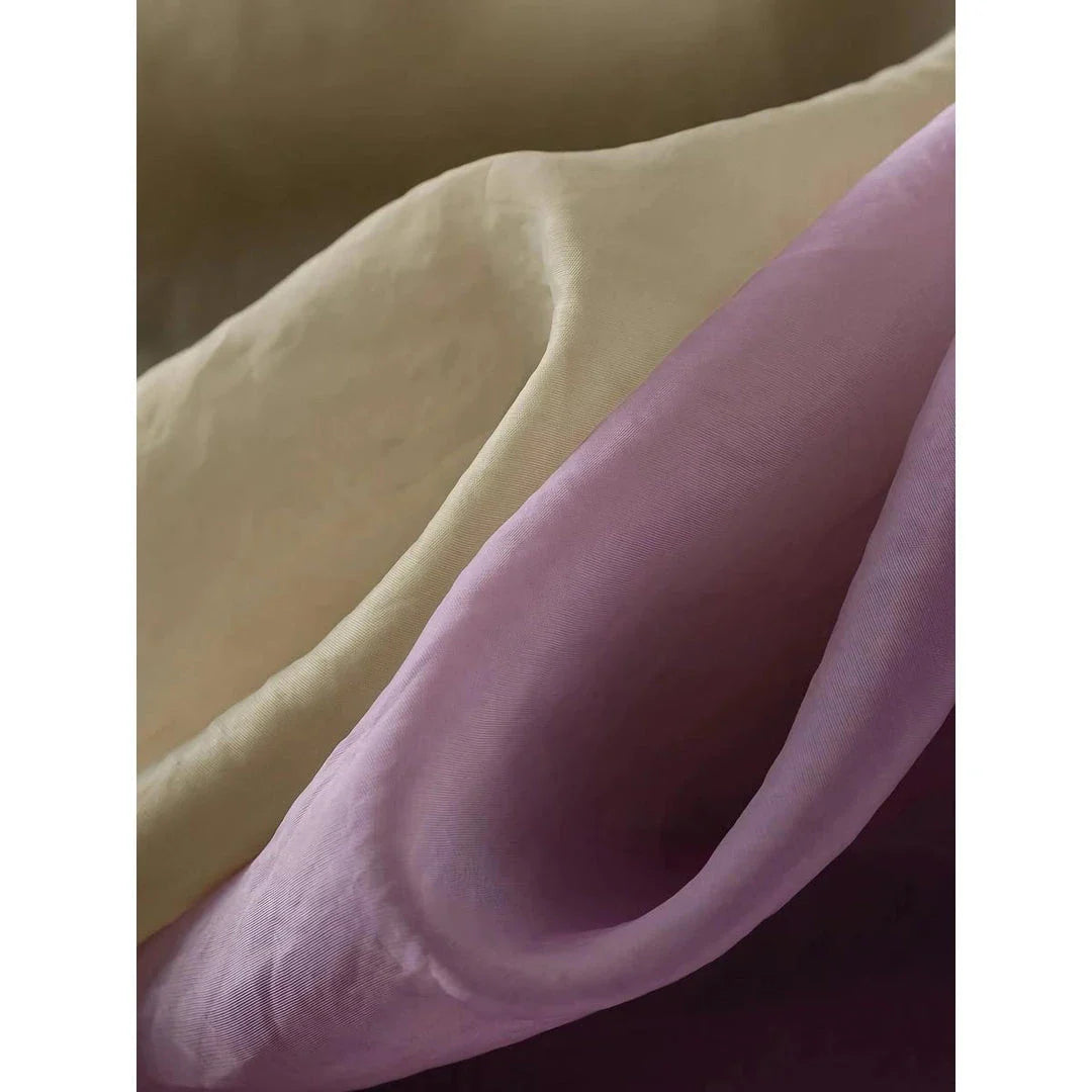 Elegant high-waist a-line midi skirt in a solid, vibrant colour for professional and social wear