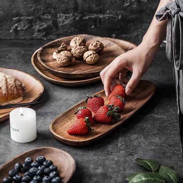 Elegant wooden dining plates with a minimalist, laconic design and natural wood grain