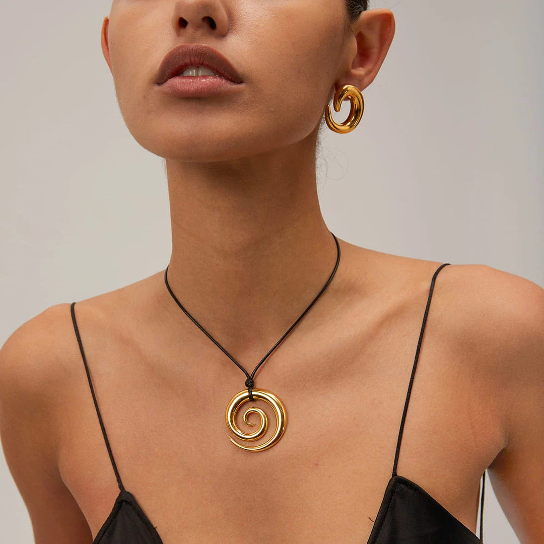 Elegant 18K gold-plated spiral circle pendant necklace made of premium stainless steel with a timeless design