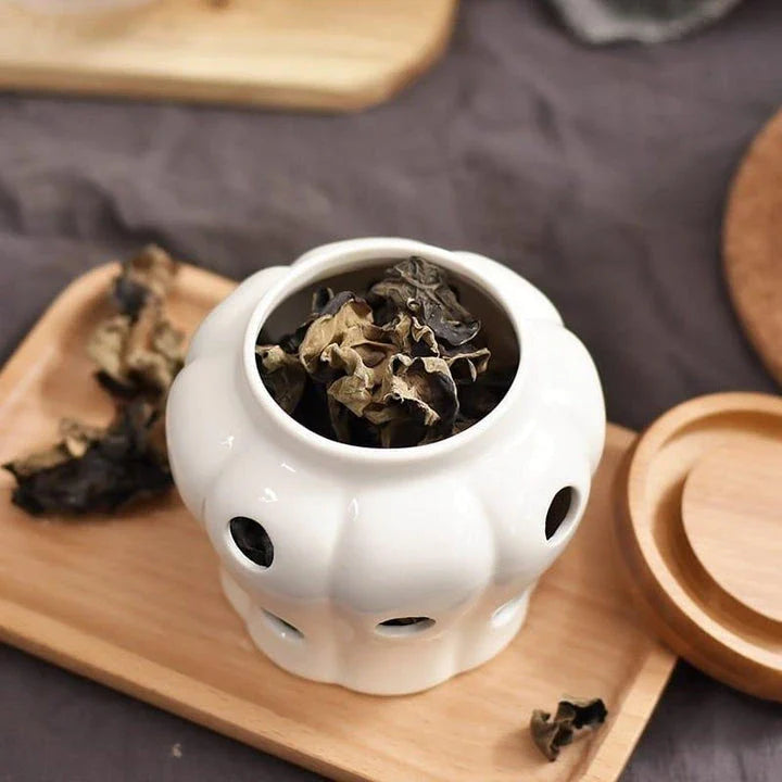 Ceramic and wood garlic storage jar with airtight design and stylish appearance for modern British kitchens